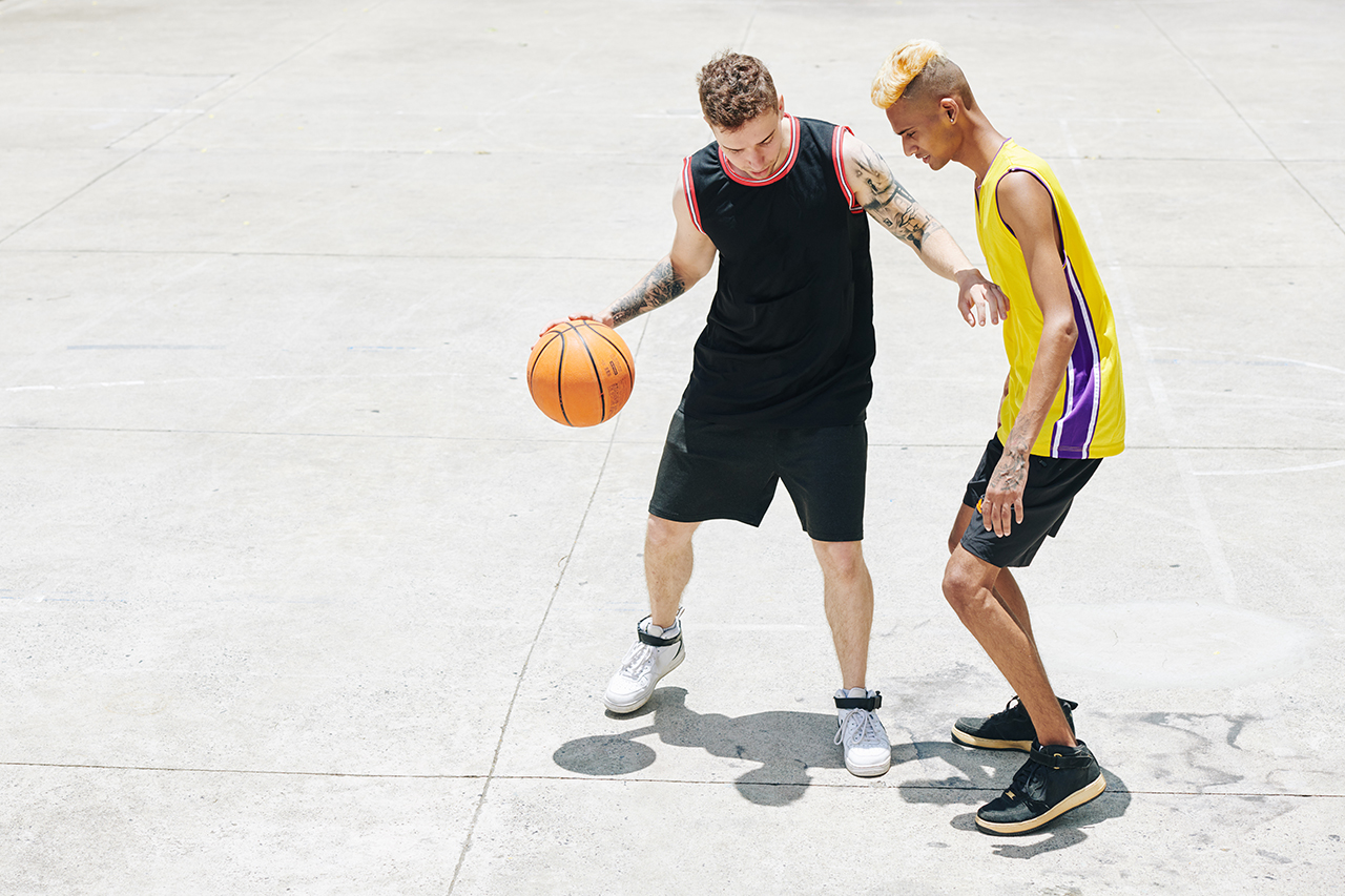 Basketball athlets training on outdoor court